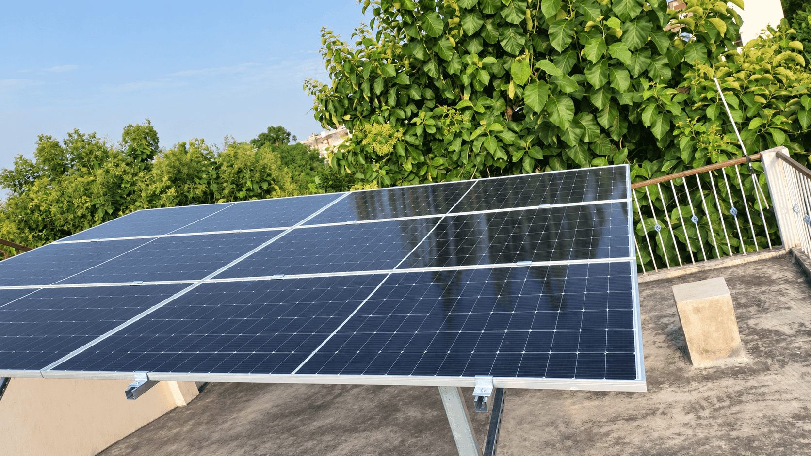 Completed rooftop solar panel array at Harendra Gupta's residence.